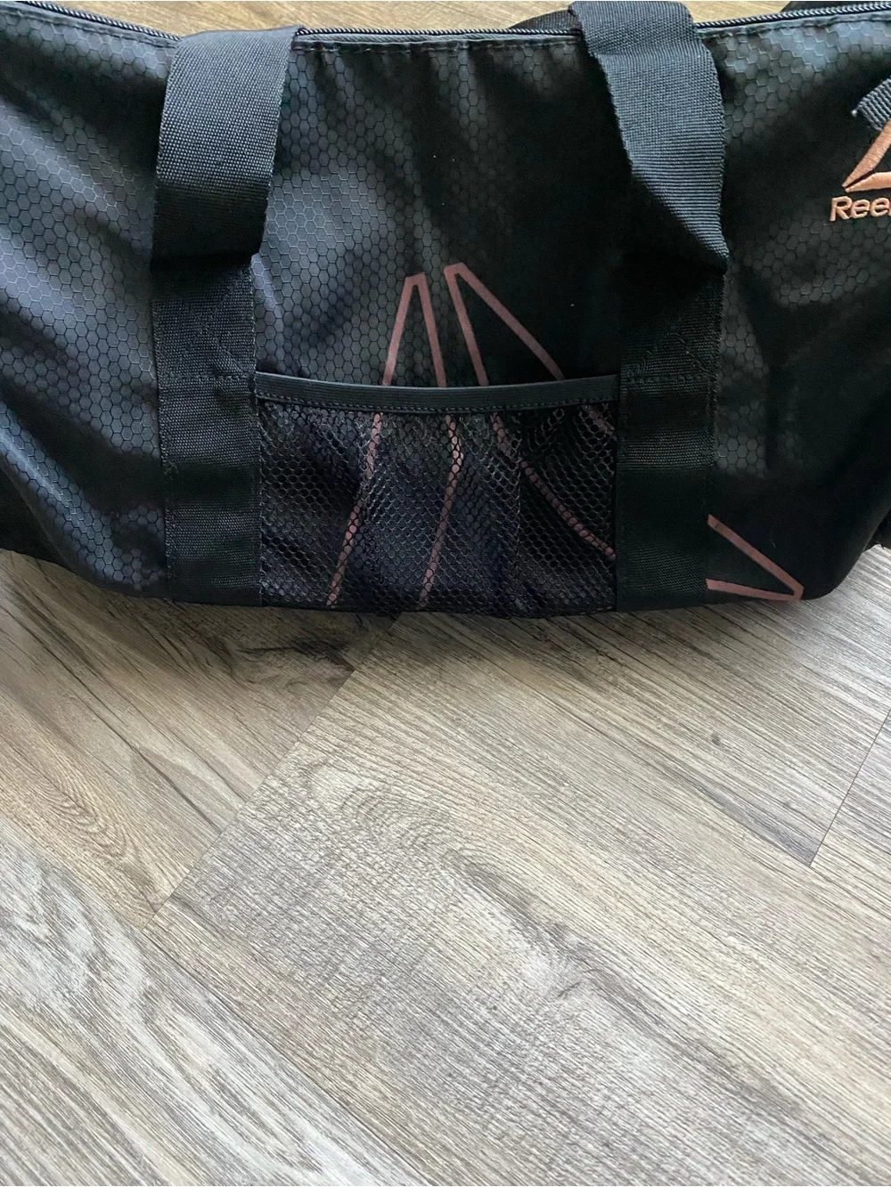 Reebok Women’s Black Duffel Bag with Subtle Rose Accents